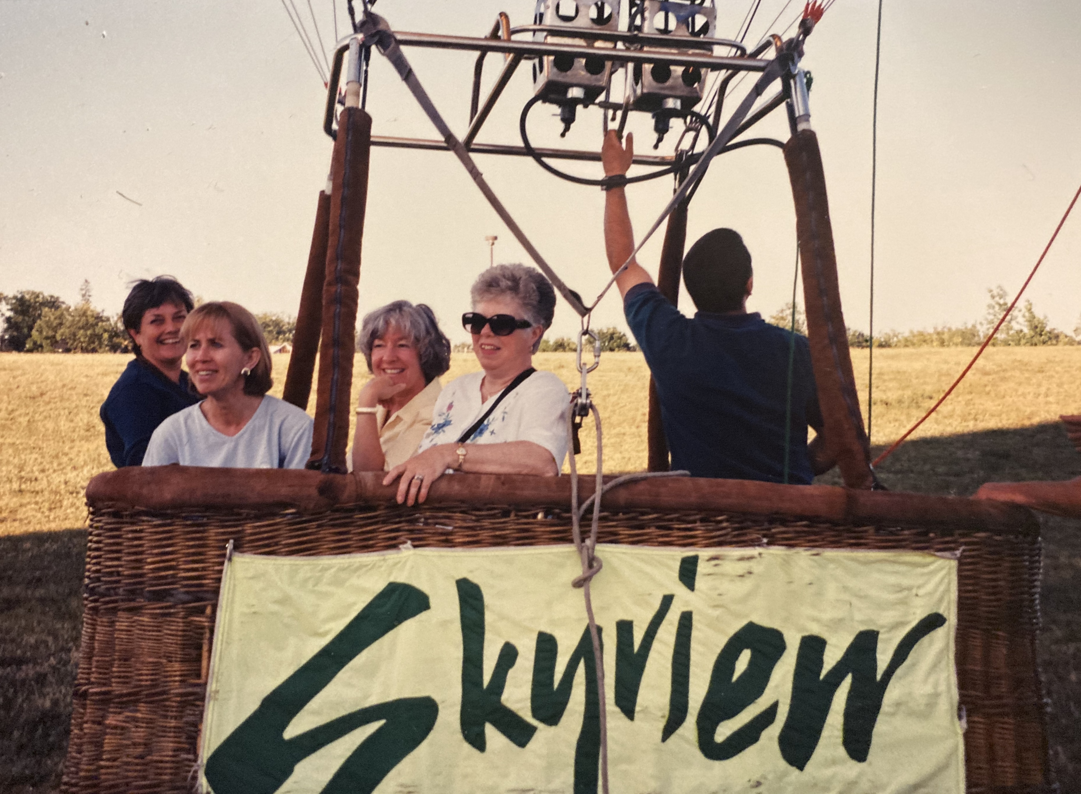 June with friends in hot air balloon, 1990s